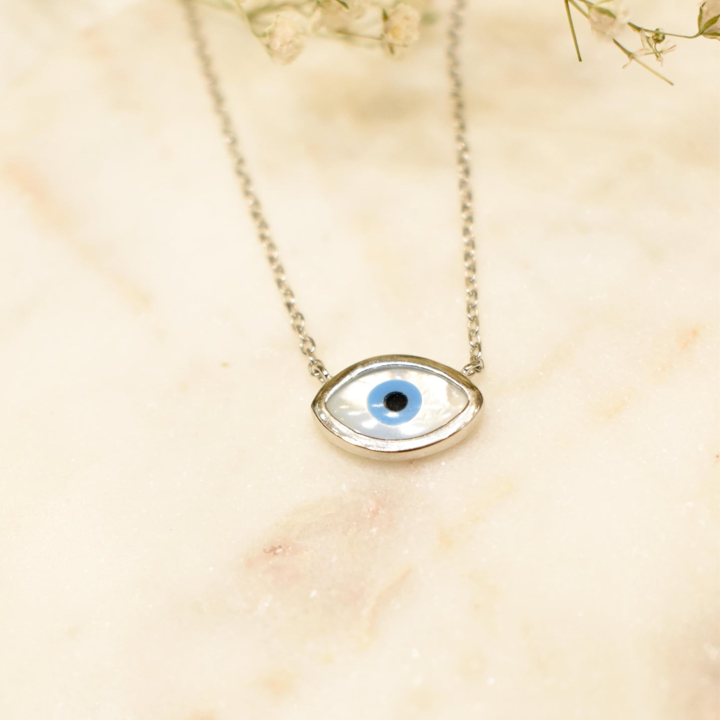 BESHEEK Gold-edged White Druzy-Style Evil Eye Resin Pendant Necklace?